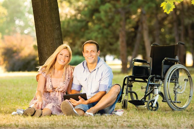 happy couple sitting abc medical wheelchair.jpg